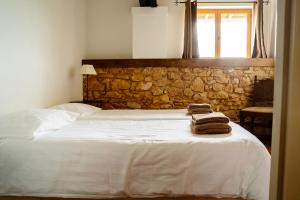 Posteľ alebo postele v izbe v ubytovaní Chateau Camp del Saltre Prayssac
