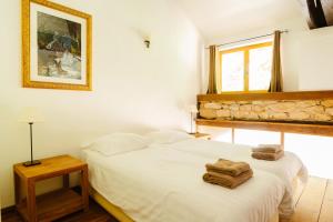 Posteľ alebo postele v izbe v ubytovaní Chateau Camp del Saltre Prayssac