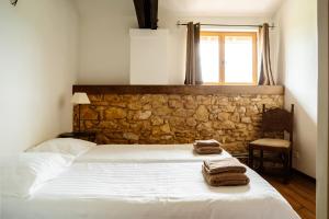 Posteľ alebo postele v izbe v ubytovaní Chateau Camp del Saltre Prayssac