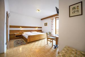 Postel nebo postele na pokoji v ubytování Zilli Rooms