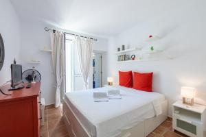 En eller flere senge i et værelse på BeGuest Cascais Casa da Tia Marta