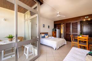 Voodi või voodid majutusasutuse BeGuest Praia da Rocha Sea View toas