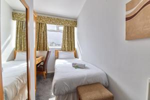 Voodi või voodid majutusasutuse Properties Unique Dene Rooms - Single Room toas
