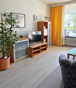 TV a/nebo společenská místnost v ubytování Fürstenhof Whg 7 + 8 fotografií