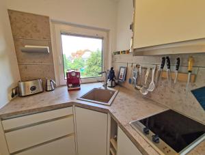 Kuchyň nebo kuchyňský kout v ubytování Haus Baltic 139 + 9 fotografií