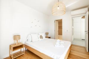 Uma cama ou camas num quarto em BeGuest Only Good Vibes - Cabanas