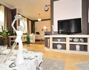 TV a/nebo společenská místnost v ubytování Deluxe Apartments Bremen Typ C