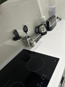 Dapur atau dapur kecil di CYRUS Hôtel -Housse cœur de ville