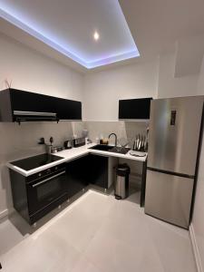 Dapur atau dapur kecil di CYRUS Hôtel -Housse cœur de ville