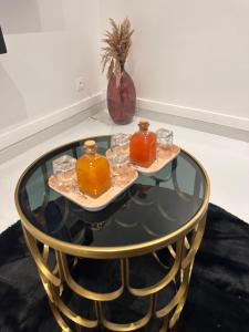 Minuman di CYRUS Hôtel -Housse cœur de ville