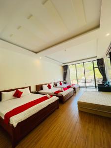 Ένα ή περισσότερα κρεβάτια σε δωμάτιο στο Cherry hotel