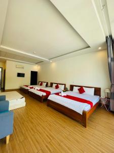 Ένα ή περισσότερα κρεβάτια σε δωμάτιο στο Cherry hotel