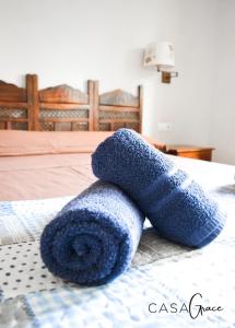 Łóżko lub łóżka w pokoju w obiekcie Rentalfue Tamarindo 1 casa Grace