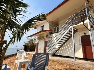 Balkón nebo terasa v ubytování Tchin tchin Guesthouse