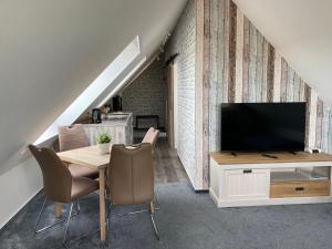 TV a/nebo společenská místnost v ubytování Windmühle 15