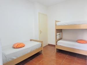 Ένα ή περισσότερα κρεβάτια σε δωμάτιο στο HOUSE DAMA