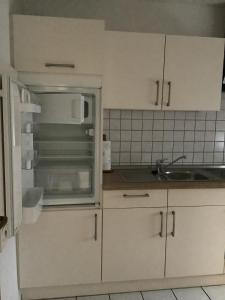 Küche/Küchenzeile in der Unterkunft Thesing RE22