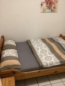 Ein Bett oder Betten in einem Zimmer der Unterkunft Thesing RE22