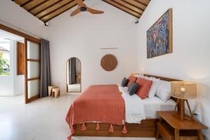 Ένα ή περισσότερα κρεβάτια σε δωμάτιο στο Villa Mandara Double Six +124 φωτογραφίες