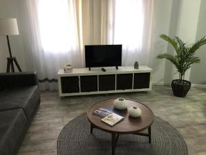 Televízia a/alebo spoločenská miestnosť v ubytovaní Apartamento AQUAVIVA - El Médano