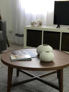 Televízia a/alebo spoločenská miestnosť v ubytovaní Apartamento AQUAVIVA - El Médano