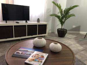 Televízia a/alebo spoločenská miestnosť v ubytovaní Apartamento AQUAVIVA - El Médano