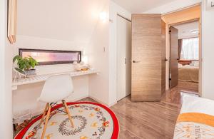 Ein Bett oder Betten in einem Zimmer der Unterkunft 駅4分新築92平米車庫付一戸建丸貸し和風寝室広いリビング上野秋葉原東京品川直通