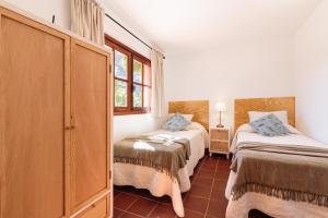 Postel nebo postele na pokoji v ubytování Casa del Mejicano