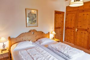 Letto o letti in una camera di Chesa Alvra - Celerina
