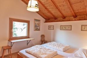 Letto o letti in una camera di Chesa Alvra - Celerina