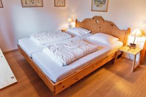 Letto o letti in una camera di Chesa Alvra - Celerina