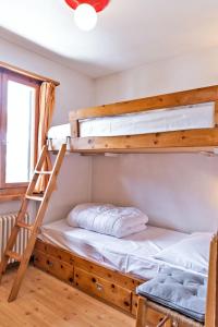 Letto o letti in una camera di Chesa Dal Gial - Celerina