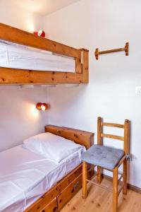 Letto o letti in una camera di Chesa Dal Gial - Celerina