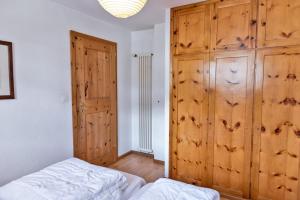 Letto o letti in una camera di Chesa Dal Gial - Celerina