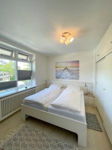 Ένα ή περισσότερα κρεβάτια σε δωμάτιο στο Haus Bi de Wyk C19