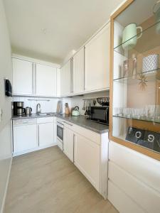 Η κουζίνα ή μικρή κουζίνα στο Haus Bi de Wyk C19