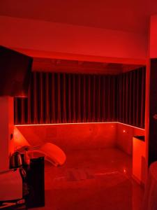 Postel nebo postele na pokoji v ubytování B&B GRECALE Suite & Spa