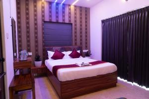 Postel nebo postele na pokoji v ubytování Pomma Holidays and Resorts