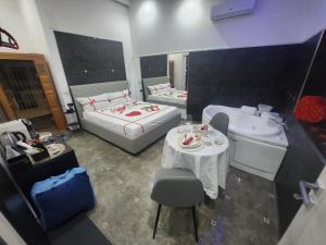 Postel nebo postele na pokoji v ubytování B&B GRECALE Suite & Spa