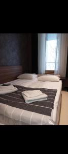 Postel nebo postele na pokoji v ubytování WOODside 70m2 Kopaonik