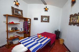 Postel nebo postele na pokoji v ubytování Jafferji Beach Retreat