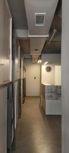 a hallway of an office building with a ceiling at C2 Pods in Varanasi +23 photos