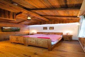 A bed or beds in a room at Chalet Steinbock St Martin am Tennengebirge