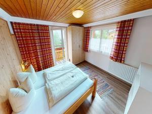 Posteľ alebo postele v izbe v ubytovaní Chalet in Neukirchen