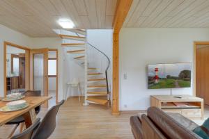 Μια τηλεόραση ή/και κέντρο ψυχαγωγίας στο Waldfee mit eigener Sauna