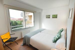 Postel nebo postele na pokoji v ubytování Earra - Itxaso - Garaje incluído - 2 minutos playa