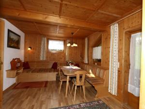 A seating area at Apartment in Mayrhofen with a balcony