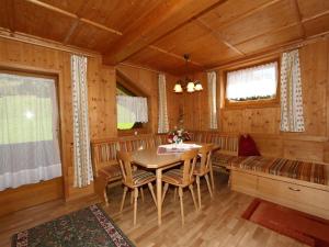 A seating area at Apartment in Mayrhofen with a balcony