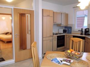 Η κουζίνα ή μικρή κουζίνα στο "Meeresrauschen-Whg-05"