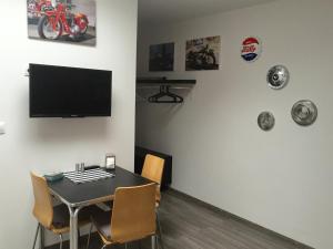 TV a/nebo společenská místnost v ubytování Penzion Hirmann